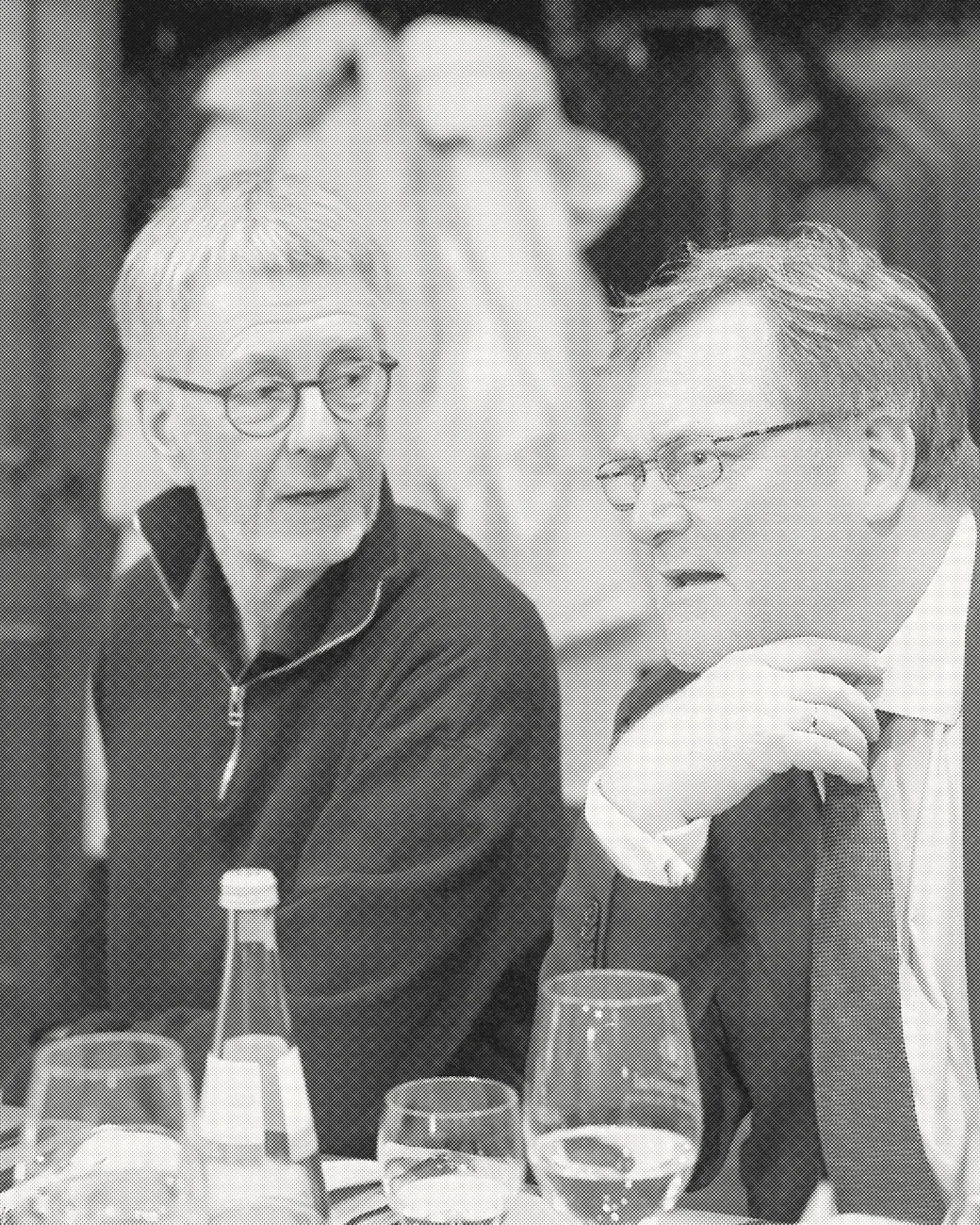 Two clients in a consultation